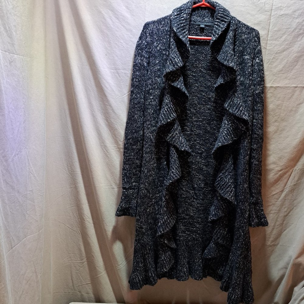 Woman's knitted cardigan with ruffle style